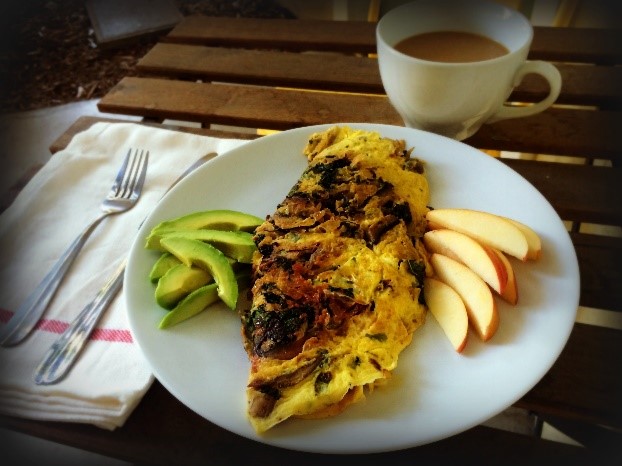 An omelette filled with healthy greens and veggies. 